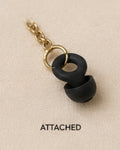 ARKS earplug and gold clasp connection, attached close-up