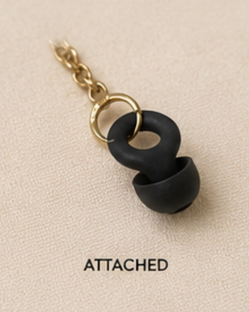 ARKS earplug and gold clasp connection, attached close-up